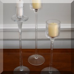 D30. 3 Glass candlesticks. 